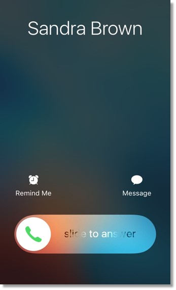 Users will see 3 interactive buttons at the bottom when there is an incoming call from a non Office@Hand contact. Slide the Answer button to the right to take the call.